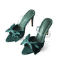 Elegante slingback met hoge hakken en strikje